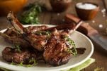 Grilled lamb cutlets served with halloumi and hummus